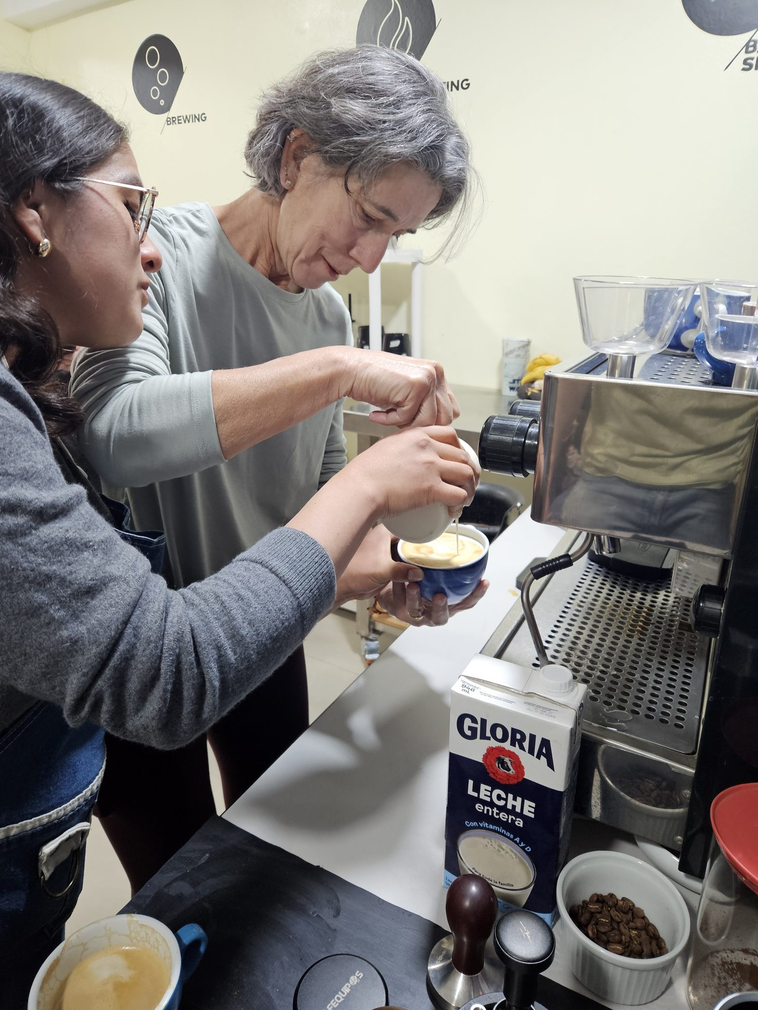 Espresso extraction running into a small glass at the Cusco coffee lab