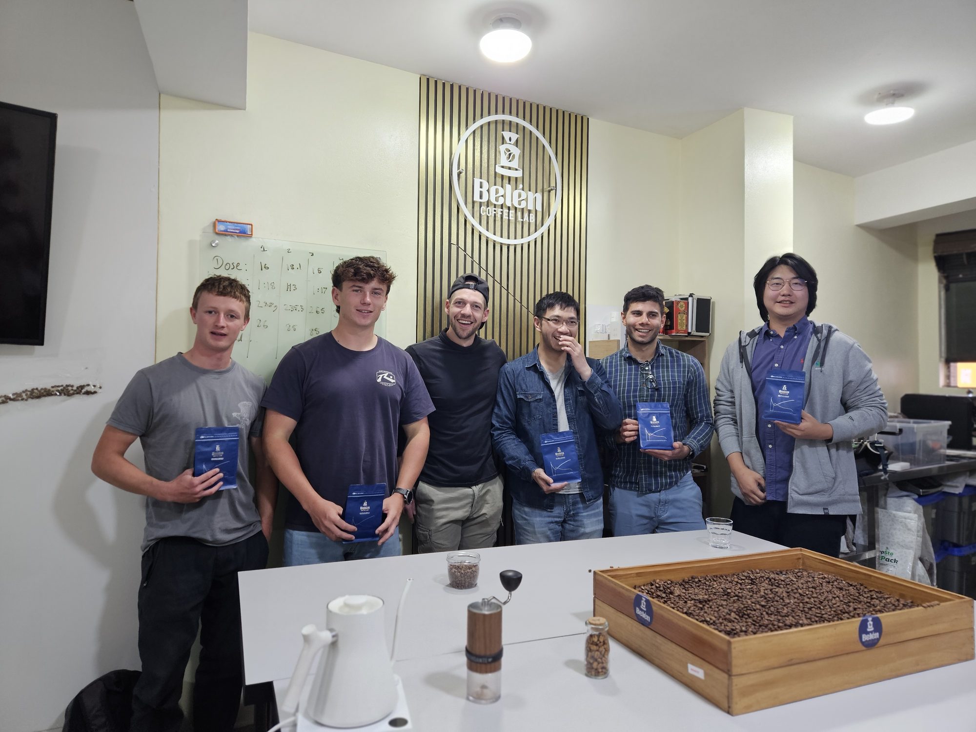 Workshop group gathered around the table at the Cusco coffee lab